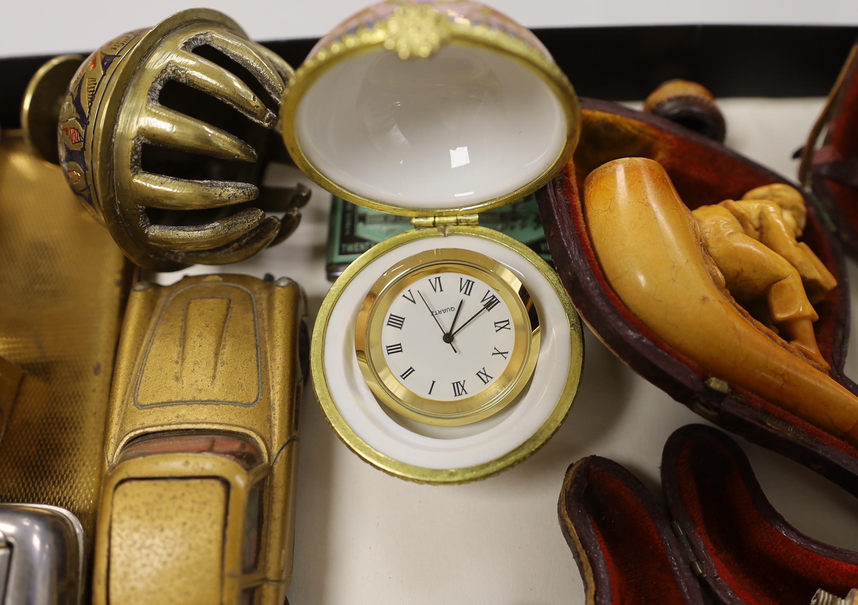 A group of mixed collectables including a Corgi James Bond Aston Martin DB, smoking pipes etc.